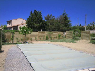 Réalisation de clôture panneaux bois